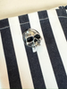 sterling silver skull cufflink on shirt