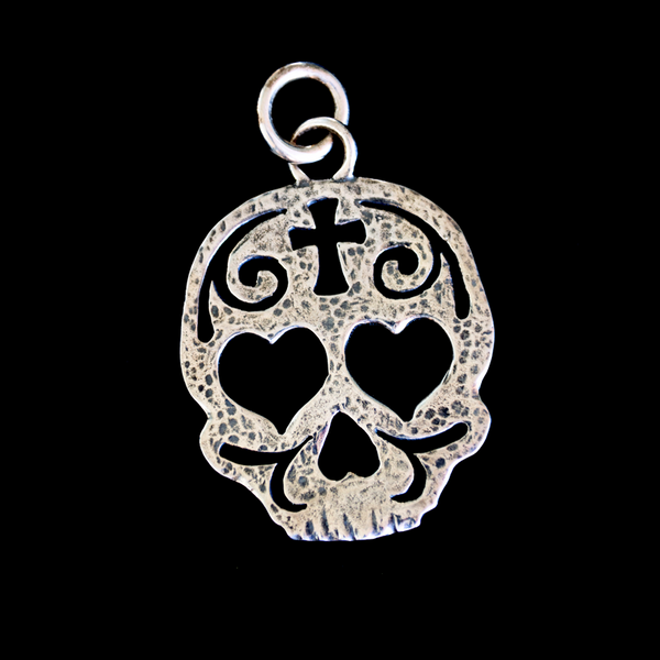 Lola Bell Skull Pendant on black. 