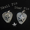 Silver Star Guitar Pic Pendant and skull guitar pic pendant on black.