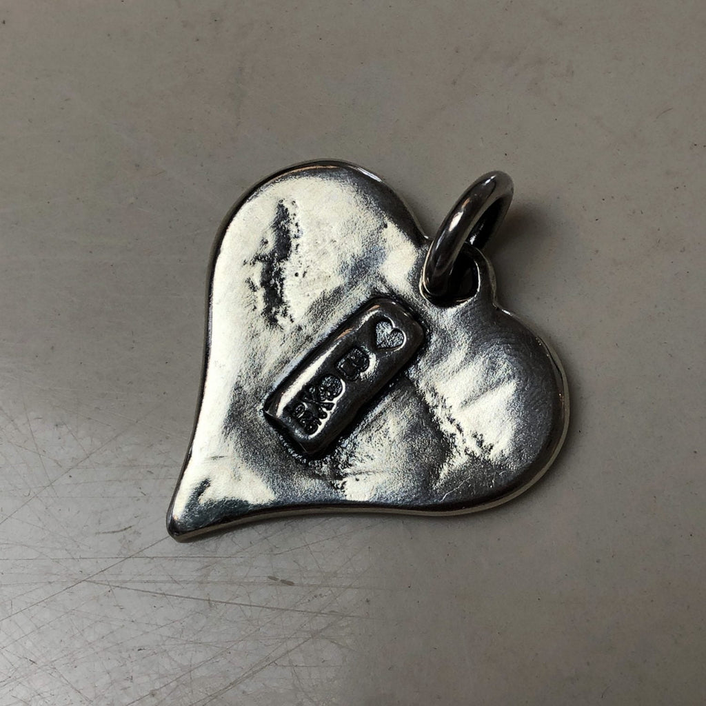 Heart 13 Pendant backside showing makers mark.