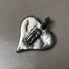 Heart 13 Pendant backside showing makers mark.