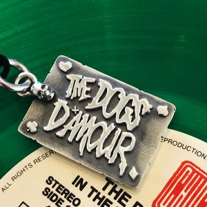 dogs d'amour pendant on vinyl album by the dogs d'amour.
