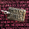 dogs damour pendant laid on top of dogs d'amour lyrics.