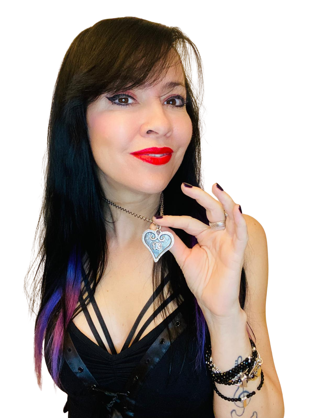 Woman holding a heart 13 pendant against a white background