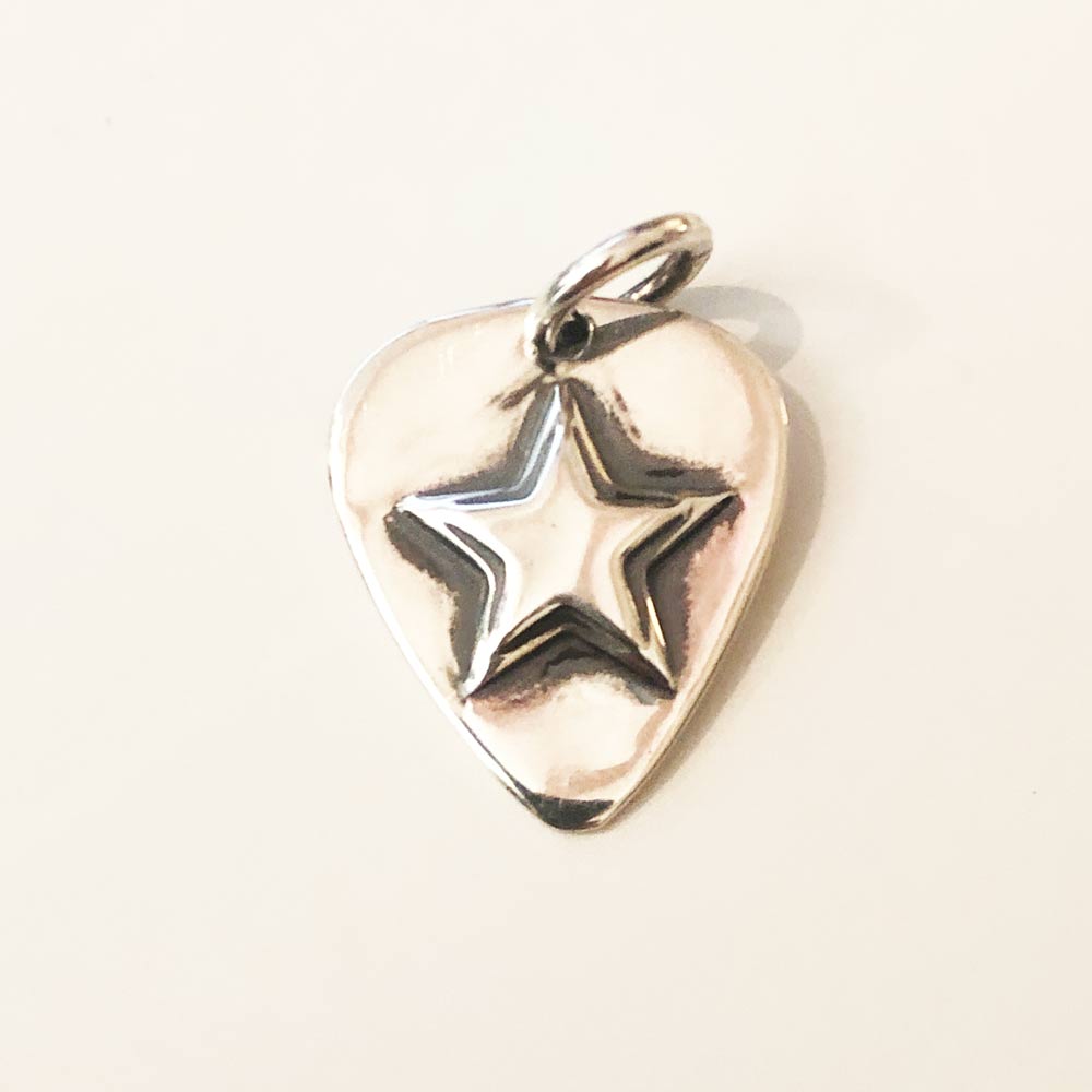 Silver Star Guitar Pic Pendant on white.
