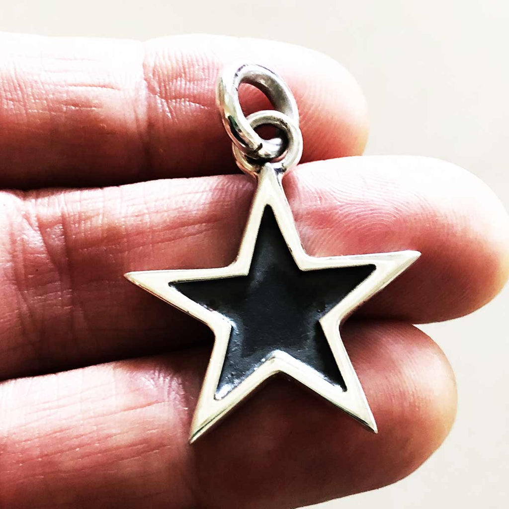 The Star Pendant in hand