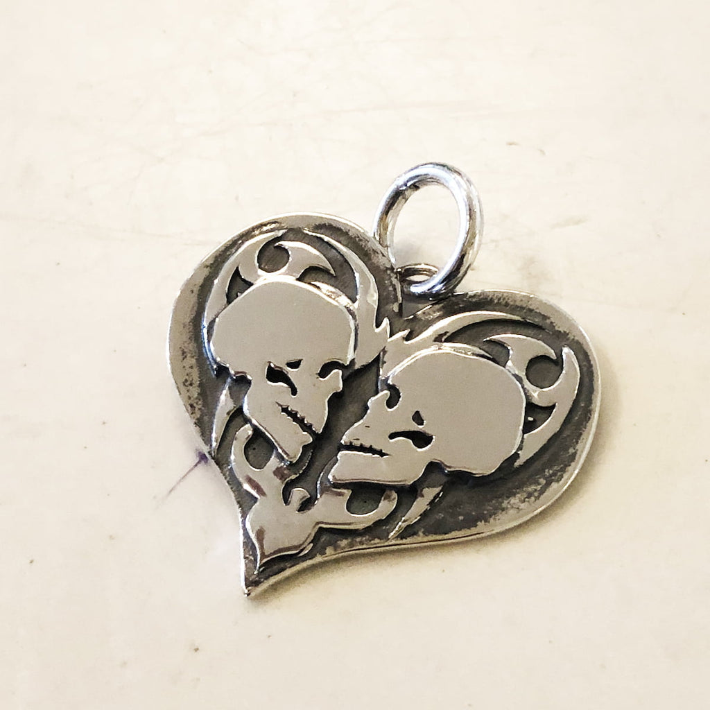 True Love Double Skull Pendant on white. 