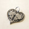 True Love Double Skull Pendant on white. 